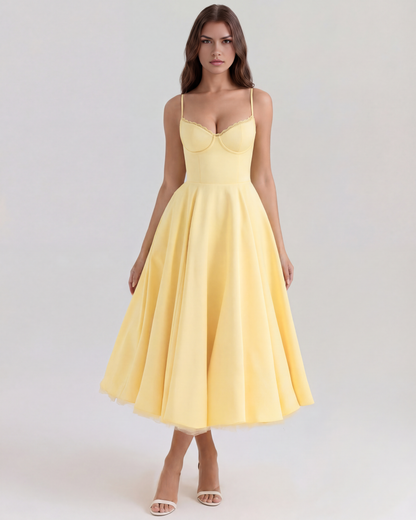 Vestido midi con corsé y falda amplia